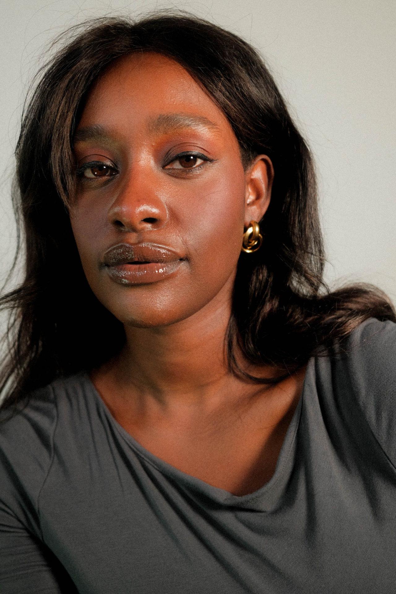 Studio portrait of Shalom, Monnaro co-founder, looking towards the camera